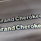 93-98 Jeep Grand Cherokee OEM 55295445 Gold Metal Emblem Pair Set 2 Front Fender