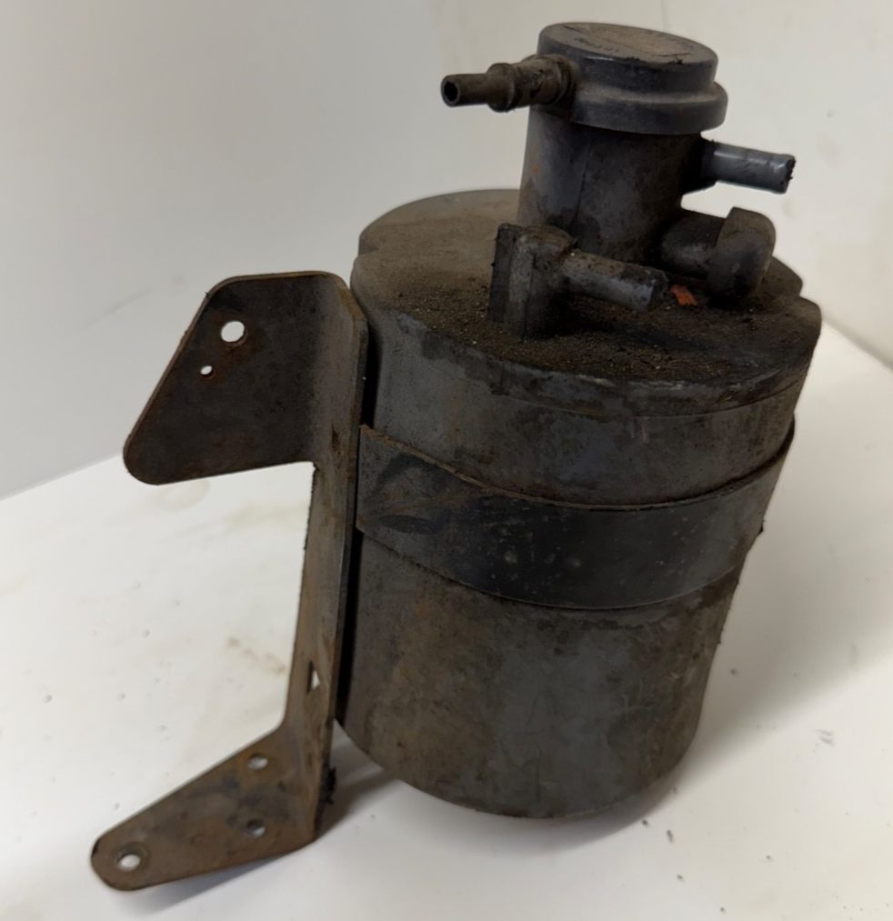 Jeep Cherokee XJ 91-95 OEM Charcoal Filter Evap Canister Bracket Mount Factory