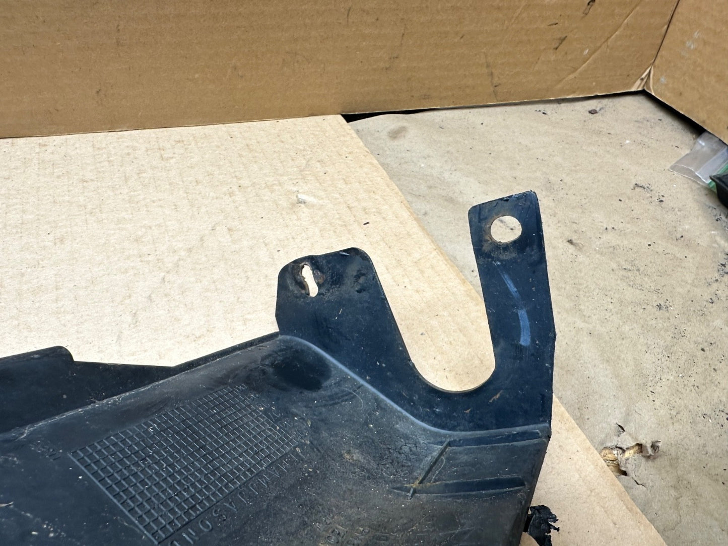 97-06 Jeep TJ Wrangler FRONT PLASTIC BUMPER COVER Frame Overlay OEM 55155667AC