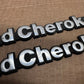 93-98 Jeep Grand Cherokee OEM 55295445 Metal Emblem Pair Set Front Fender Badge