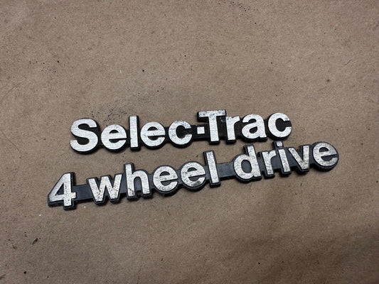 84-01 Jeep Wagoneer Cherokee XJ Selec-Trac Metal Emblem Badge Select Track OEM